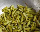 A picture of step 3 of Tindora sabji with peanut and sesame massala.