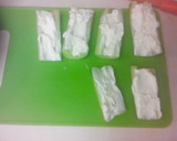 A picture of step 2 of Cucumber Cheese Logs.