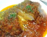A picture of step 8 of Herb Breaded Chicken Breast Served in Tomato Sauce.