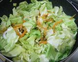 A picture of step 7 of Stir-fried Bifun Noodles with lots of Spring Cabbage and Sweet Onions.