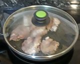 Foto del paso 1 de la receta Manitas de cerdo al pesto de ajo y perejil