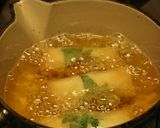 A picture of step 6 of Chicken Tender, Shiso and Mentaiko Spring Rolls.