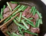 A picture of step 4 of Chinese Style Stir-Fried Beef and Asparagus.