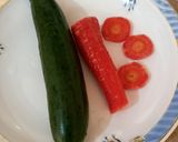 A picture of step 1 of Carrot and cucumber salad 🥗 🥕🥕🥒🥒🥗.