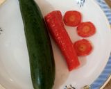 A picture of step 1 of Carrot and cucumber salad 🥗 🥕🥕🥒🥒🥗.