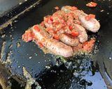 Une image de l'étape 8 de Saucisses de Toulouse grillées aux tomates,romarin et épices.
