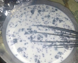 A picture of step 2 of Oreo Pudding Cake.