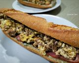 Foto del paso 5 de la receta Bocadillo de revuelto de hamburguesa con bacon y queso azul