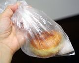 A picture of step 9 of Melt-in-your-mouth Hawaiian Malasada Donuts.