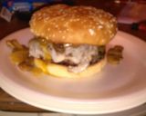 A picture of step 1 of Cream cheese stuffed burgers this glazed onions and mushrooms.