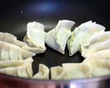 A picture of step 6 of Crispy Gyoza Dumplings with Bean Sprouts and Garlic Chives.