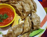 A picture of step 8 of Steamed Wheat Momos Stuffed with Paneer and Veggies.