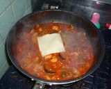 A picture of step 4 of Super Quick Chicken & Tomatoes.