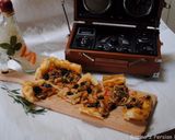 A picture of step 11 of Puff pastry pizza with Raisins & bell pepper.