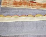 Foto del passaggio 7 della ricetta Roselline di pasta sfoglia e mele