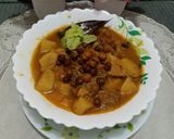 A picture of step 9 of Desi Spiced Chickpeas and Potatoes.