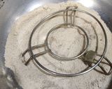 A picture of step 10 of Cheesy Paneer Potlis.