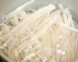 A picture of step 1 of Tofu with Nametake-style Enoki Mushroom Sauce.