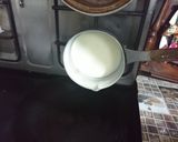 A picture of step 3 of Rio biscuit chocolate cake.