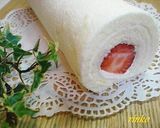 A picture of step 16 of Pure White Roll Cake.