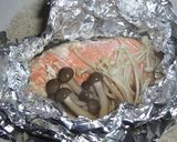 A picture of step 5 of Easy Foil-Baked Salmon with Butter and Soy Sauce.