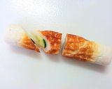 A picture of step 2 of Chikuwa Stuffed with Cheese, Cucumbers, and Takuan.