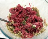 A picture of step 1 of Meatloaf with tomato and red pepper sauce.