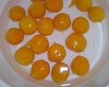A picture of step 2 of Candied kumquats.