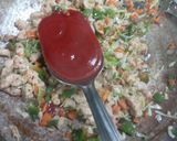 A picture of step 5 of American chopsuey with fried rice.