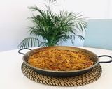 Foto del paso 3 de la receta: Paella de oreja de cerdo con puerro y ajos tiernos