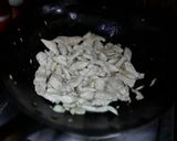 A picture of step 2 of Pad See Ew / Stir Fried Wide Rice Noodles with Chicken.