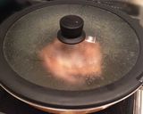 A picture of step 13 of Authentic Garlic Chicken in a Frying Pan.
