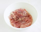 A picture of step 1 of Sweet and Savory Chicken Thighs with Shiso Leaves.