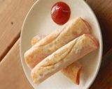 A picture of step 5 of Pan-fried Gyoza with Rolled Ham and Cheese.