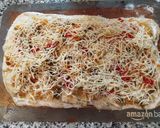 Foto del paso 10 de la receta: Masa de pizza con multisemillas casera con queso de untar y verduras