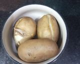 A picture of step 1 of Aloo Pitika.