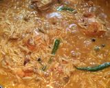A picture of step 9 of One Pot Chicken Rice.