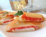 A picture of step 9 of Veggie and Italian Spring Rolls For Vegans.
