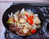A picture of step 4 of Nikujaga (Simmered meat and potatoes) with Thick Cut Pork Belly.