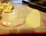 A picture of step 11 of Bosnian Crescent Rolls.