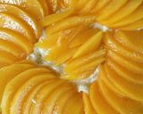 A picture of step 5 of Yellow Peach Almond Cream Tart.