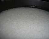 A picture of step 1 of How to Make Rice in a Frying Pan.