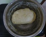 A picture of step 2 of Simple Fluffy Mini Bread Loaves Using a Pound Cake Pan.