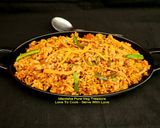 A picture of step 5 of Veg Schezwan Fried Matta Red Rice.