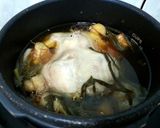 A picture of step 2 of Chicken Soup With Essence Of Chicken.