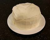 A picture of step 14 of Vanilla Christmas Layer Cake with Creamy Vanilla Buttercream Frosting.
