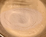 Foto del paso 7 de la receta: Bizcocho de leche con pepitas de chocolate