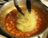 A picture of step 9 of Simmered Seafood Spaghetti.