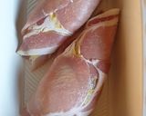 A picture of step 3 of Chicken wrapped in Bacon.