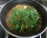 A picture of step 6 of Addictive! Mild Kimchi Jjiage (Korean-style Stew).
